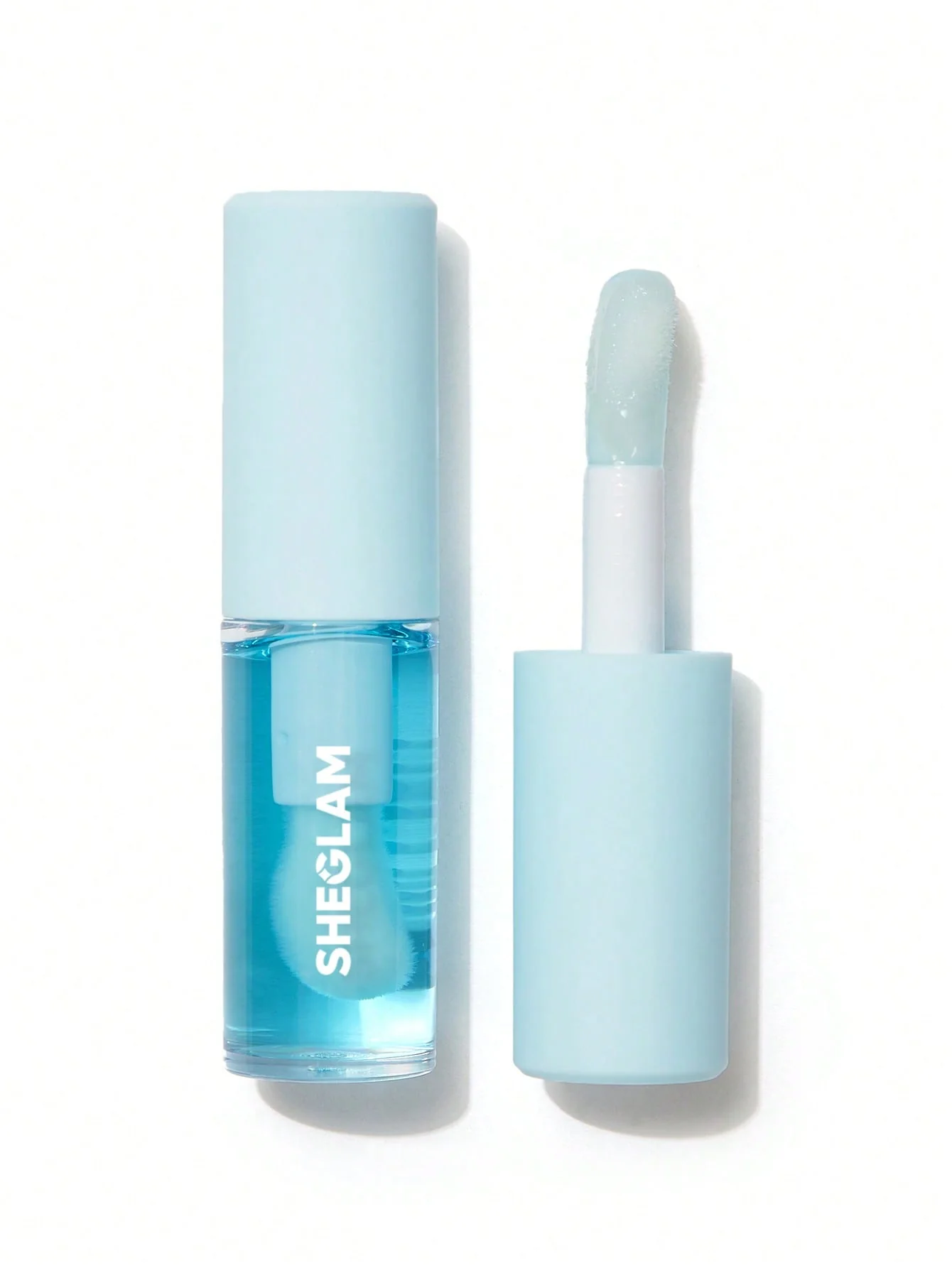 sheglam-JELLY-WOW-HYDRATING-LIP-OIL-MALI-BLUE-BERRY1-1 روغن لب آبرسان شیگلم رایحه Mali-blue Berry - تصویر 1